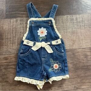 Vintage Denim shortalls overalls with ruffle trim and embroidered flower